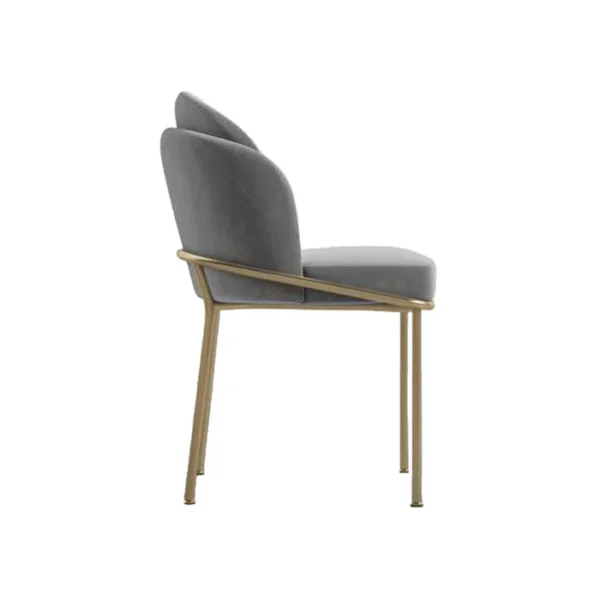 Modern metal dining room chair with a minimalist frame, straight backrest, and slim legs, placed beside a dining table